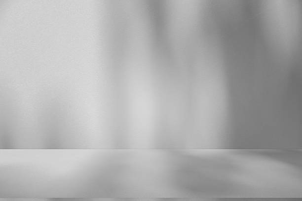 istock Wall interior background, studio and backdrops show products.with shadow from window color white . background for text insertion and presentation product 2232294885