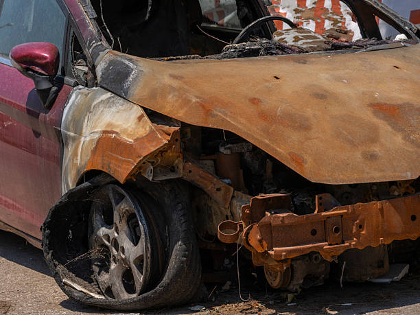 abandoned car in car graveyard