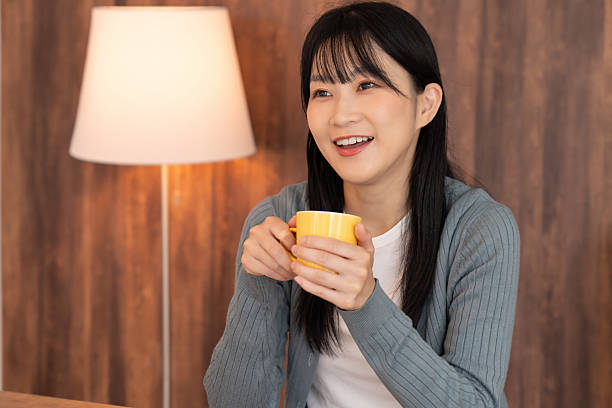 istock attractive asian woman relaxing 2232299583