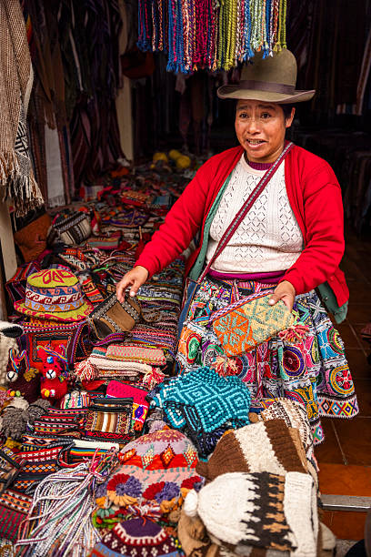 istock Peruvian woman spinning a wool in Pisac, Urubamba Valley 2232318832