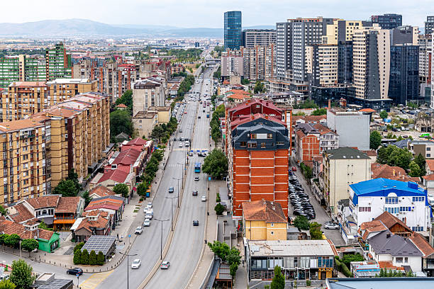 A high angle view looking west down Bill Clinton Boulevard in Pristina
