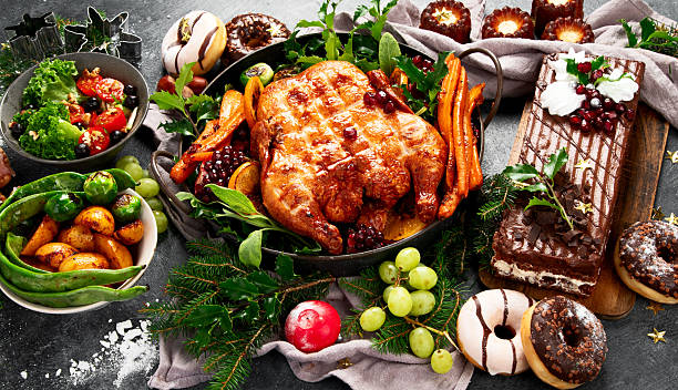 istock Festive dinner table with roasted chicken. Christmas family dinner. 2232319191