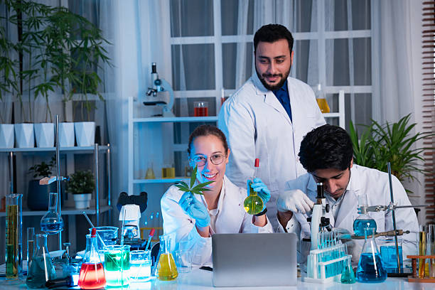 istock A group of young scientists are conducting experiments in the lab using a microscope., Aspiring scientists are busy running laboratory experiments 2232319730