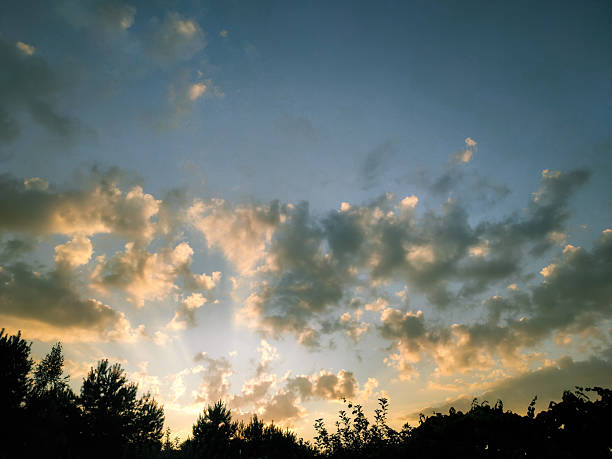 Colorful clouds on the dramatic sunset sky. Beautiful colorful sky with clouds at sunset