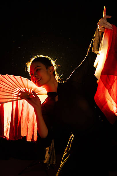 The girl dancing under the stage lights