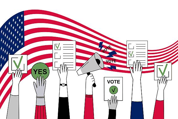 istock Hands with megaphone and ballot on American flag background 2232329283