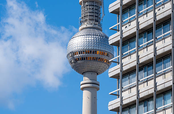 Low angle view the famous television tower in Alexanderplatz. Berlin, Germany. Image taken during sunset.