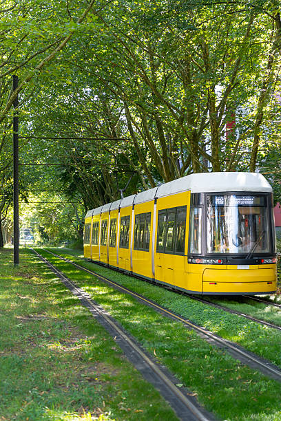 istock Berlin tram on the tramway in the grass field 2232331131