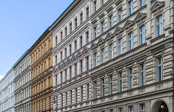 Colorful and ornate historic buildings in Berlin, Germany. Capturing architectural charm with vibrant details under a clear blue sky.