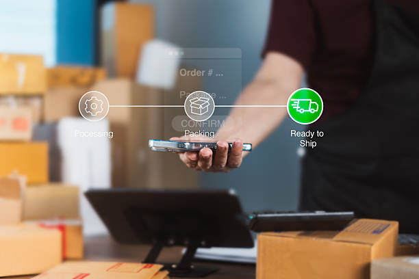 istock E-commerce seller tracking order status with smartphone and digital logistics icons showing process from packing to ready-to-ship 2232333856
