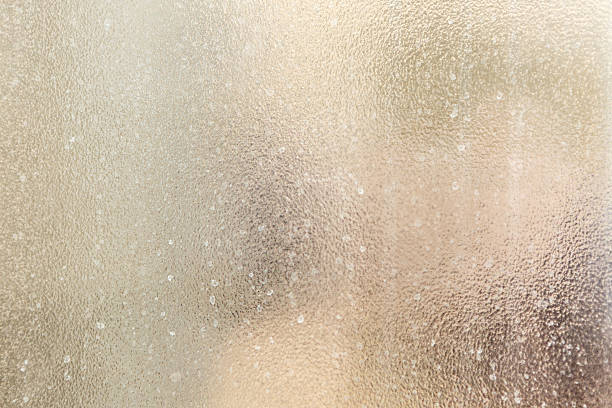 Frosted glass texture with abstract blurred background in soft colors