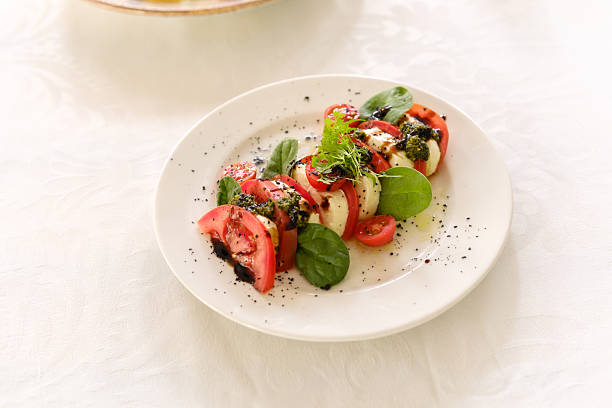 delicious and fresh caprese salad with mozzarella and tomato