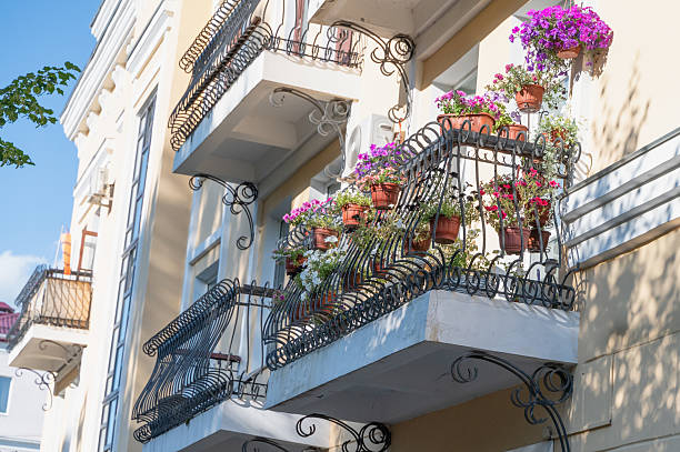 istock Balconies adorned with colorful flowers and charming railings create an inviting ambiance 2232338411