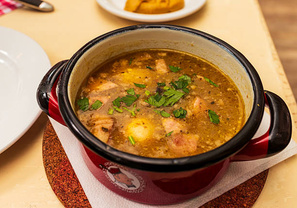 istock Traditional Polish sour rye soup in pot 2232343747