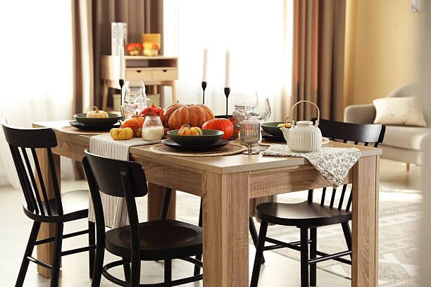 istock Stylish table setting with beautiful autumn decor in dining room 2232345186