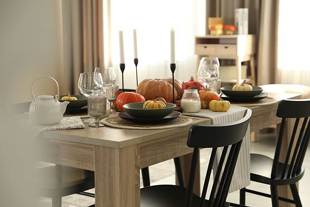 istock Stylish table setting with beautiful autumn decor in dining room 2232345204