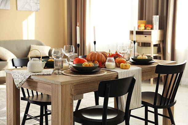 istock Stylish table setting with beautiful autumn decor in dining room 2232345234