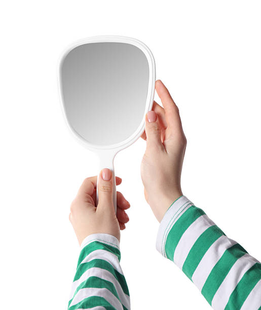 istock Woman holding small mirror on white background, closeup 2232345923