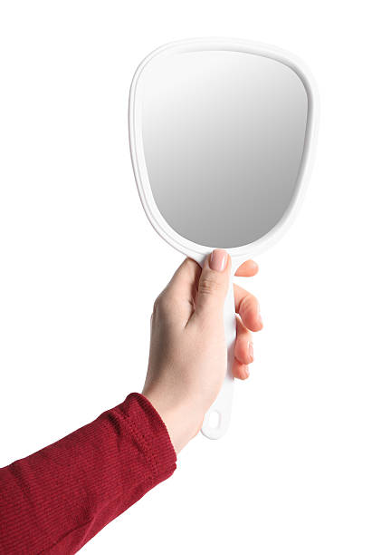 istock Woman holding small mirror on white background, closeup 2232345939