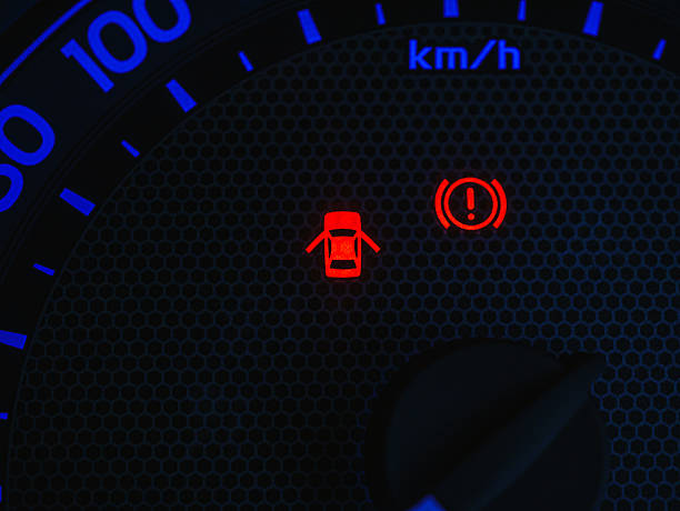 istock warning light, close up of warning light on car dashboard 2232347412