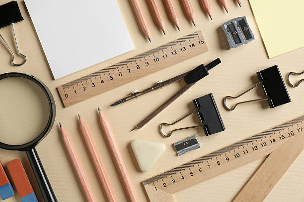 istock Flat lay composition with ruler and other stationery on beige background 2232348906