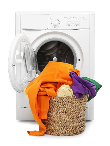 istock Modern washing machine and laundry basket isolated on white 2232349063