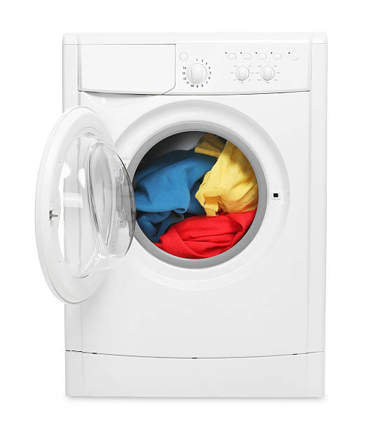 istock Modern washing machine with clothes in drum isolated on white 2232349069