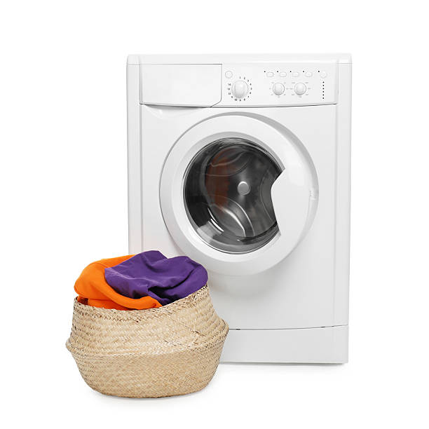 istock Modern washing machine and laundry basket isolated on white 2232349070