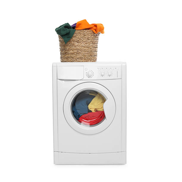 istock Modern washing machine and laundry basket isolated on white 2232349084