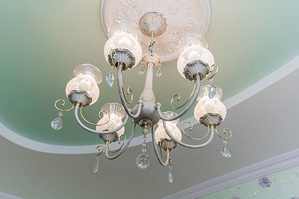 istock A chandelier hangs from the ceiling in a room with a blue ceiling 2232351171