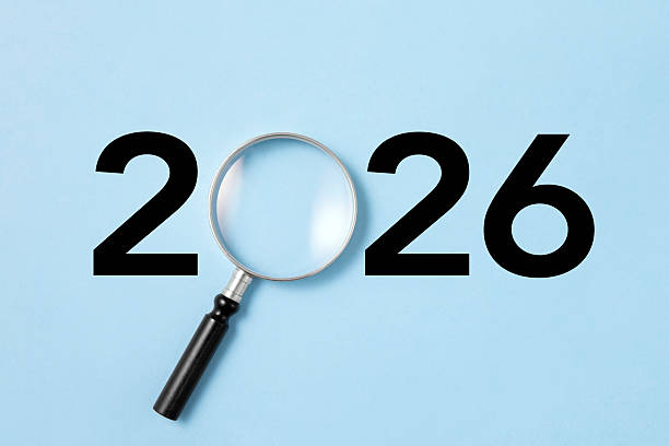 istock New Year 2026 with Magnifying Glass 2232352676