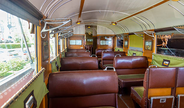 istock Vintage bus interior showcasing classic seating and design from mid-20th century with bright natural light streaming in 2232352991