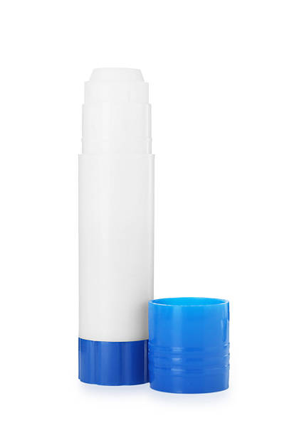 istock One glue stick and cap isolated on white 2232353332