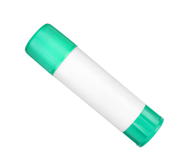 istock One glue stick isolated on white, top view 2232353486