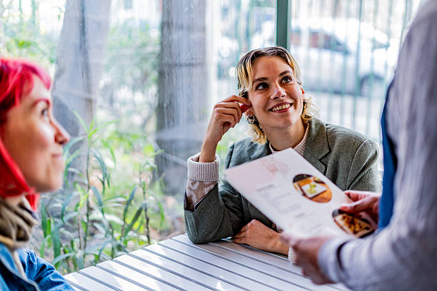 istock Customers ordering at a coffee shop 2232355777