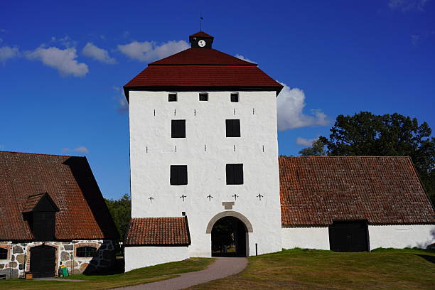 Hässleholm, Sweden - August 24, 2025\n - The gate tower and part of the large stable belonging to Hovdala Manor (Hovdala Slott), located in Skåne county. The restoration of the 16th century stone manor stronghold earned the Europa Nostra Award for preservation of cultural heritage in 2003.