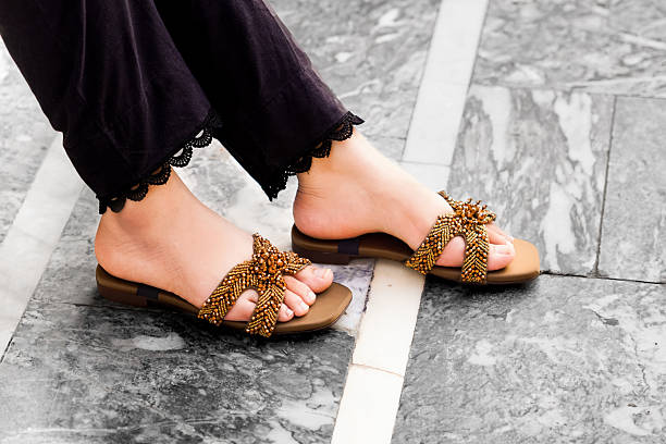 istock Beaded Sandals: Elegant Brown Flat Slides with Exquisite Detail 2232356697