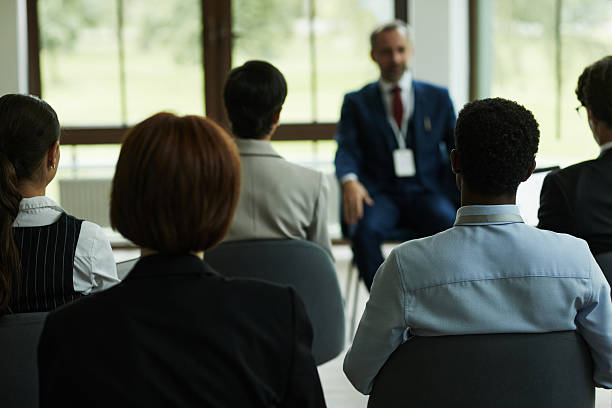 istock Diverse Group of Young and Middle Aged People Attending Seminar 2232357362