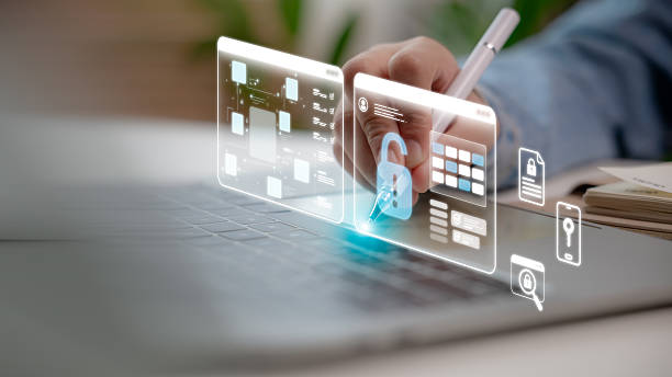 istock Businessman hand using laptop with digital lock and cybersecurity interface. Concept of data protection, privacy, secure access, IT security and online safety technology. 2232359584