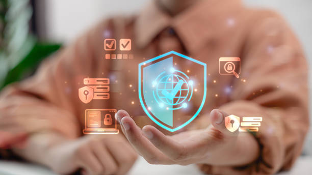istock Businessman holding digital shield icon with cybersecurity, global data protection, privacy, secure access and online safety technology for business and finance security. 2232359596