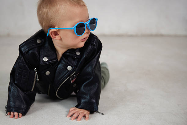 istock Cool Baby in Leather Jacket and Sunglasses 2232359813