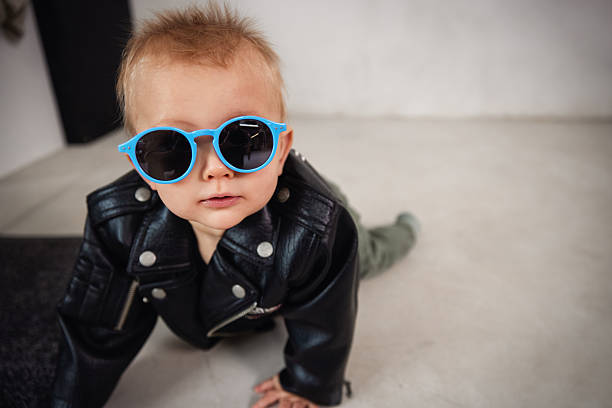 istock Cool Baby in Leather Jacket and Sunglasses 2232359829