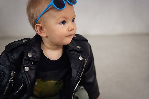 istock Cool Baby in Leather Jacket and Sunglasses 2232359837