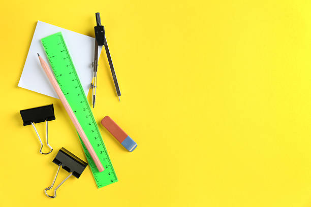istock Flat lay composition with ruler and other stationery on yellow background, space for text 2232361187