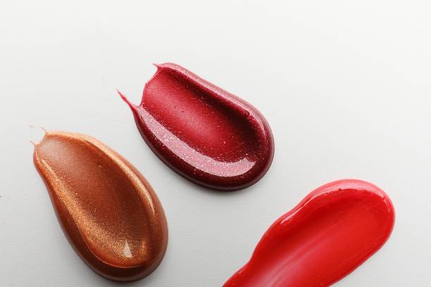 istock Smears of different lip products on white background, top view 2232361447