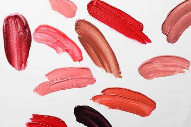 istock Smears of different lip products on white background, top view 2232361459