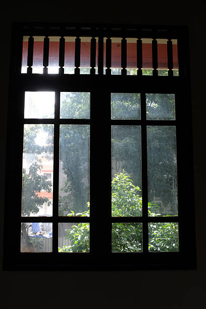 istock View from window with tree scene. Garden through the window. Window overlooking the trees. 2232361724