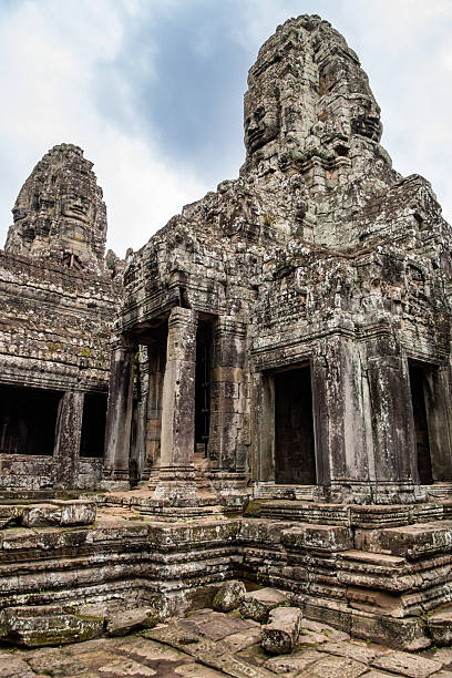 An ancient temple located within Angkor Thom, part of the Angkor Archaeological Park in Cambodia. The stonework and detailed carvings showcase the cultural heritage and architectural mastery of ancient Khmer craftsmanship.