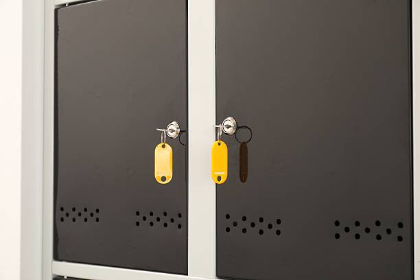 istock Modern lockers with bright keys, closeup view 2232362928