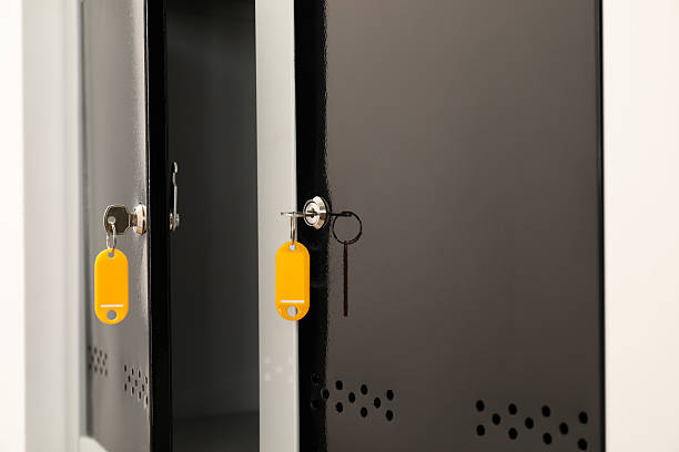 Modern lockers with bright keys indoors, closeup
